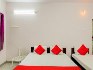 Кровать или кровати в номере OYO Ram Residency