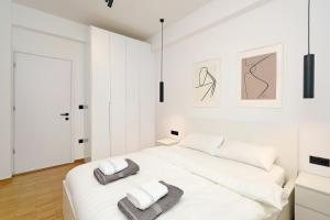 Posteľ alebo postele v izbe v ubytovaní Cosmopolitan Kolonaki - Greecing