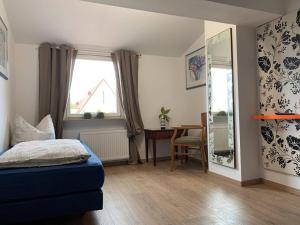 Postel nebo postele na pokoji v ubytování Pension für Monteure in Leipzig