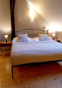 Postel nebo postele na pokoji v ubytování Boutique Hotel Templ