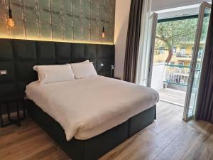 Letto o letti in una camera di Romi Suite
