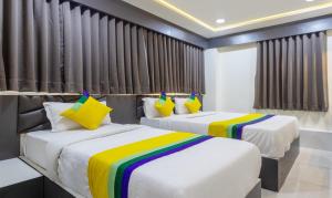 Postel nebo postele na pokoji v ubytování Itsy Hotels Signature, Nehru Nagar + 26 fotografií