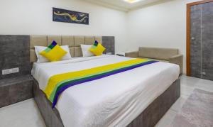 Postel nebo postele na pokoji v ubytování Itsy Hotels Signature, Nehru Nagar