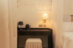 Postel nebo postele na pokoji v ubytování Magda Boutique Rooms