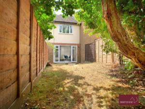 an empty yard in front of a house at Twyford - Modern 2 Bedroom House - Garden and Parking in Twyford