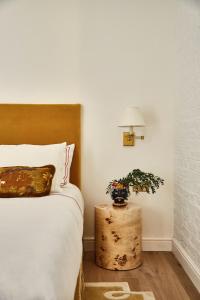 Postel nebo postele na pokoji v ubytování Magda Boutique Rooms