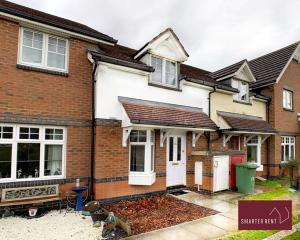 a brick house with white doors and windows at Bracknell - 2 Bedroom Home With Garden & Parking in Easthampstead