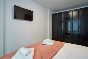 En eller flere senge i et værelse på Bianca Residence 3 by Alz + 49 billeder