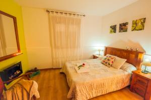 Postel nebo postele na pokoji v ubytování Casa Rural Aguas Frías I