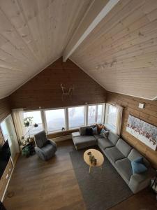 an overhead view of a living room in a house at Hytte i Neverfjord. in Kvalsund