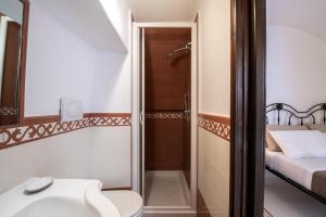 Postel nebo postele na pokoji v ubytování Casa Celidonia
