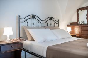 Postel nebo postele na pokoji v ubytování Casa Celidonia