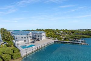 an aerial view of a large house on the water at Peaceful Palms A2 in Islamorada