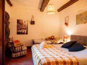מיטה או מיטות בחדר ב-Casa Tullio