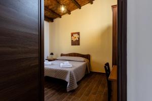 Postel nebo postele na pokoji v ubytování Fattoria F.lli Marsolo