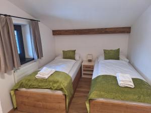 Postel nebo postele na pokoji v ubytování MountApart Ski in - Ski out - Sommercard zum halben Preis - Gültig von Juli bis September 2025