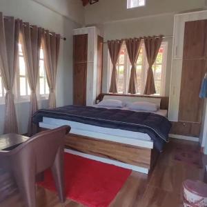 Ένα ή περισσότερα κρεβάτια σε δωμάτιο στο Saanidhya villa