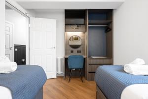 Krevet ili kreveti u jedinici u okviru objekta 312 Reids Corner - by StayDunfermline