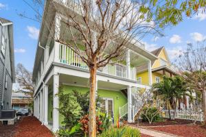a house with a tree in front of it at Gulfport Getaway in St. Petersburg