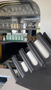 a group of rolls of paper towels on a kitchen counter at NIYAMA LAND HOTEL in Umm Lujj