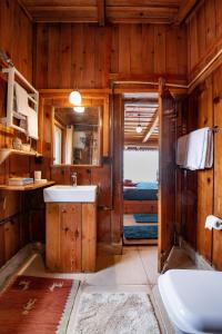 a bathroom with a sink and a toilet in a room at Sherpa Retreat Resort in Padamchen