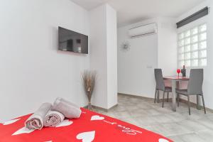 Et tv og/eller underholdning på Nerja Boutique 203 Sweet Corner