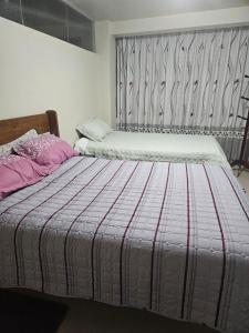 Een bed of bedden in een kamer bij PEPE´S HOUSE