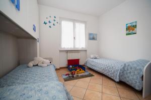 Postel nebo postele na pokoji v ubytování Gabri House