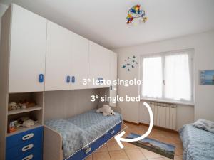 Postel nebo postele na pokoji v ubytování Gabri House