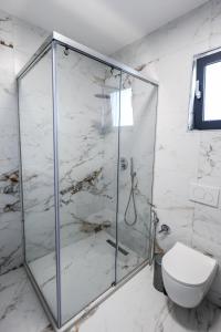 Koupelna v ubytování Sonorus Apartment + 17 fotografií