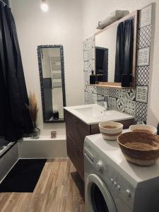 Ванна кімната в Maison « l’effet-mère »en rez de chaussée 