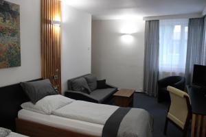 Posteľ alebo postele v izbe v ubytovaní Hotel P7