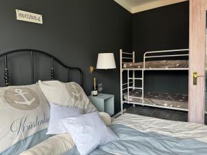 Двухъярусная кровать или двухъярусные кровати в номере Pension Ostsee-Strand