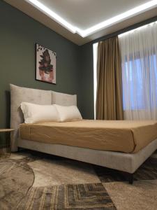 Postel nebo postele na pokoji v ubytování Oda Hotel Tirana