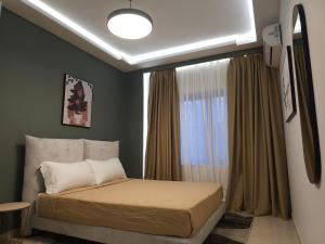 Postel nebo postele na pokoji v ubytování Oda Hotel Tirana