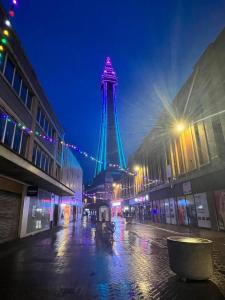 a view of the eiffel tower at night at New Derina Hotel in Blackpool