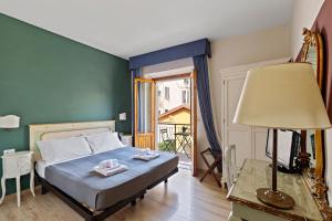 Posteľ alebo postele v izbe v ubytovaní Ostello Bello Firenze
