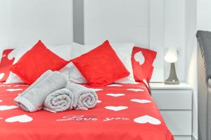 En eller flere senge i et værelse på Nerja Boutique B1 Street level + 16 billeder