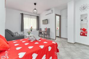 Et tv og/eller underholdning på Nerja Boutique B1 Street level