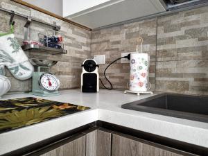 Η κουζίνα ή μικρή κουζίνα στο La mia casa rosa