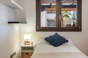 Ένα ή περισσότερα κρεβάτια σε δωμάτιο στο Apartamento Dos Mares +24 φωτογραφίες
