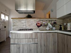 Η κουζίνα ή μικρή κουζίνα στο La mia casa rosa