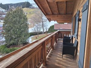 A balcony or terrace at MountApart Ski in - Ski out