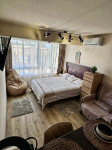Posteľ alebo postele v izbe v ubytovaní Lovely New Studio 77