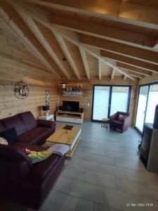 O zonă de relaxare la Ferienhaus Merlin