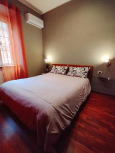 Postel nebo postele na pokoji v ubytování Appartamento dentro Roma