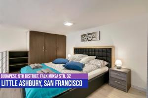 A bed or beds in a room at Little Americas Ashbury San Francisco Apartment Még 16 kép