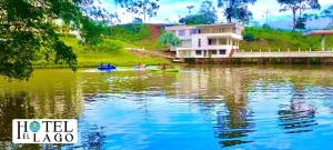 a group of people in kayaks on a river at Hotel El Lago in Mocoa