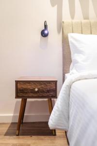 Ένα ή περισσότερα κρεβάτια σε δωμάτιο στο Couple-in magical suite with jacuzzi