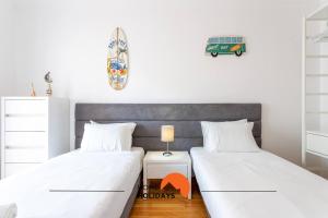 Katil atau katil-katil dalam bilik di #209 Lumina Flat by Home Holidays +44 gambar